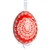 This beautifully designed egg is dyed one color, then white wax is melted and applied to form an intricate design which is left on the surfce. The egg is emptied and strung with ribbon for hanging.