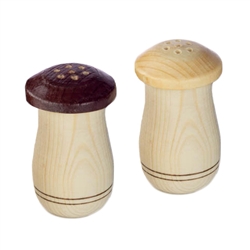 Pair of wooden salt and pepper shakers from Zakopane, Poland.  Size is approx 2.5" tall x 1.5" wide.