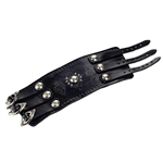 A solid piece of leather made this Wrist Band. It is adorned with nickel silver studs and buckles, and intricate tool worked designs in the leather . Made entirely by hand, this high quality piece is a work of art which any one would be proud to own. It