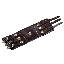 A solid piece of leather made this Wrist Band. It is adorned with nickel silver studs and buckles, and intricate tool worked designs in the leather . Made entirely by hand, this high quality piece is a work of art which any one would be proud to own. It