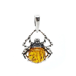 Cognac Amber Sterling Silver Spider Pendant. Round shaped amber stone set in .925 sterling silver. Genuine Baltic amber small pendant. Size is approx 1.75" x 0.5"