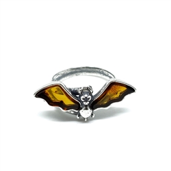 Cognac Amber Sterling Silver Bat Ring. Amber stone set in .925 sterling silver. Genuine Baltic amber ring. Front size is approx. 1" x 0.5".