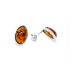 Cognac Amber Oval Stud Earrings. Amber stones set in .925 sterling silver. Genuine Baltic amber earrings. Amber Jewelry  Size is approx 0.5" x 0.4"