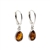 Baltic Amber Sterling Silver Earrings. Cognac Amber Sterling Silver Dangle Earrings. Teardrop-shaped amber stones set in .925 sterling silver. Dangle earrings on silver french hooks. Genuine Baltic Amber jewelry. Size is approx 1" x 0.25"