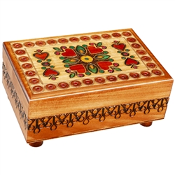 Looks like a beautifully finished and detailed wooden box from Poland (which it is), but there's more than meets the eye! This box won't open if you don't know the trick. Rotating feet unlock the box.  Interior has a red felt lined bottom.