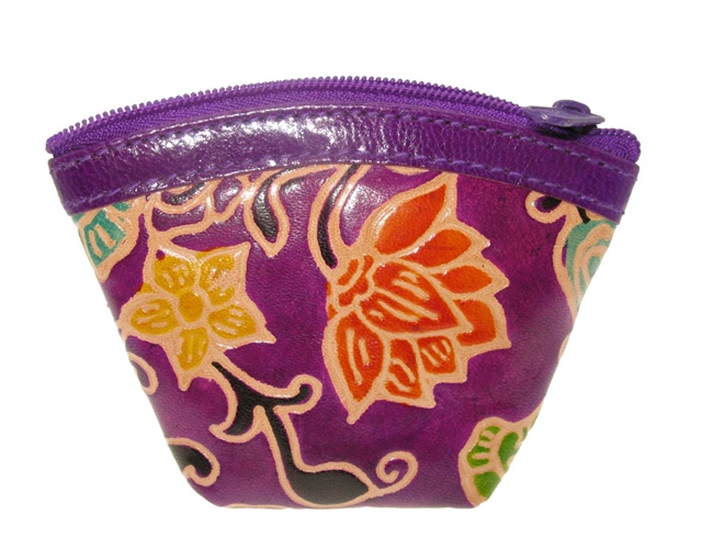 Genuine leather zip-style coin purse.  Multi color floral pattern.