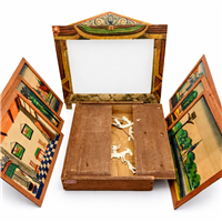 Strauss and Co Amsterdam illuminated Dutch toy theater with papier mache proscenium six hand painted scenic panels original shadow theater figures and labeled wooden case circa 1892
