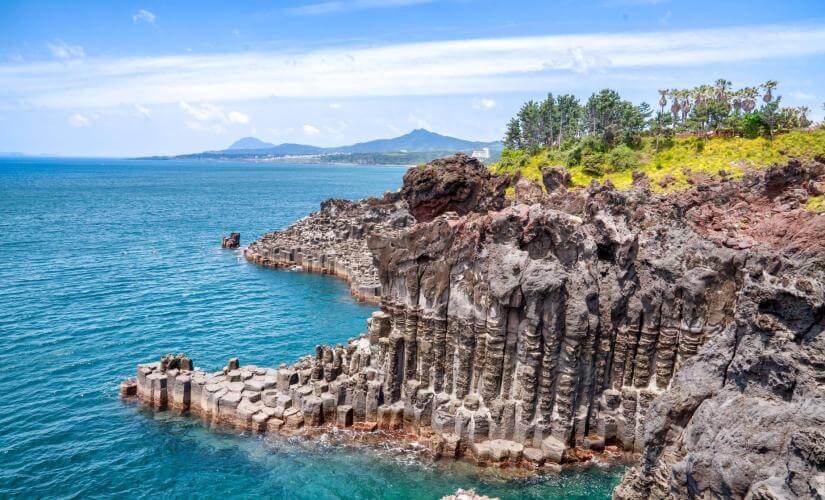 Private Jeju Coastal Highlights, Folk Village, Waterfall, and Sunrise Peak with Lunch from Cheju-do