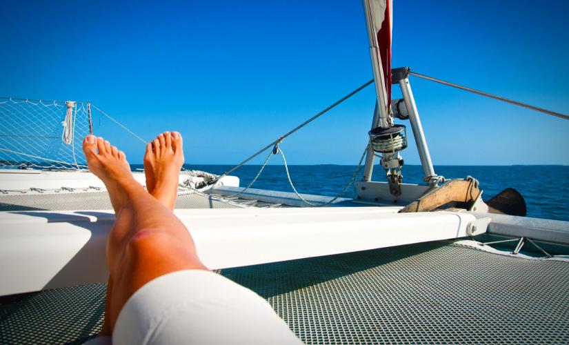 Private Half Day Catamaran Sail and Snorkel with Hotel Transportation