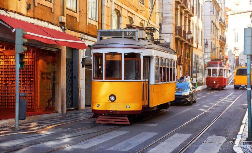 Lisbon Walking Exploration, Tram Ride, and River Cruise