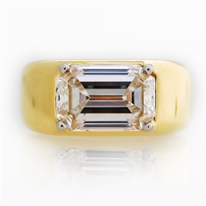 Emerald Diamond Dome Ring, 3.50ct emerald cut diamond is four prong set.