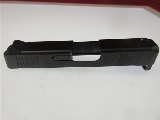 Diamondback Arms DB380 Slide Assembly
â€‹Includes Extractor, Firing Pin, Rear Sight