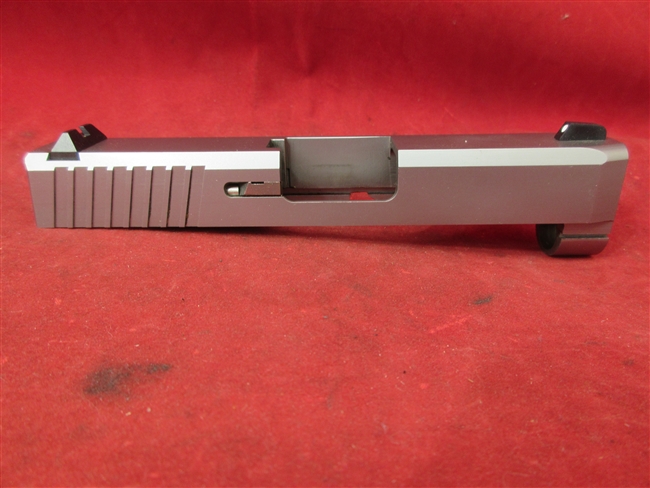 Kahr CW9 Slide Assembly
â€‹Includes Striker, Extractor & Sights