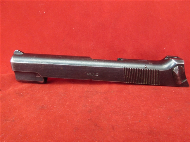 M.A.C. 1935-S Slide Assembly
â€‹Includes Firing Pin, Safety & Extractor