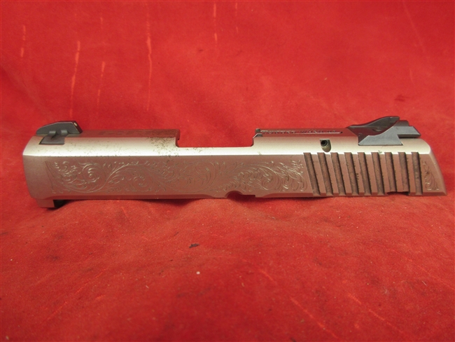 Ruger LC9 Slide Assembly
â€‹Includes Firing Pin, Extractor, Loaded Chamber Indicator,
â€‹Front & Rear Sights
