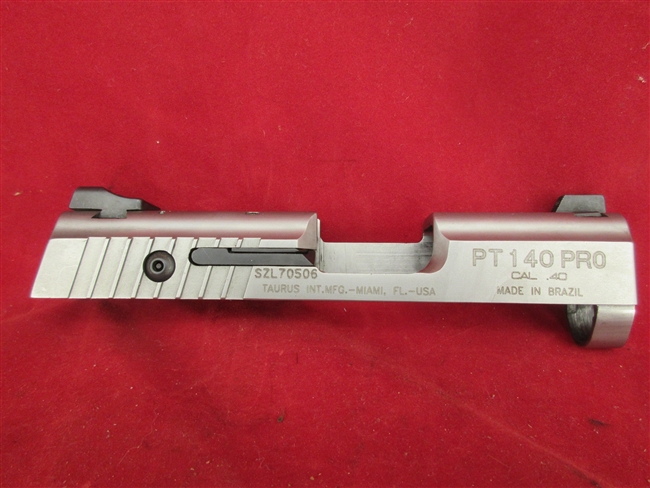 Taurus PT 140 Pro Slide Assembly  .40 Stainless
â€‹Includes Firing Pin, Sights & Extractor