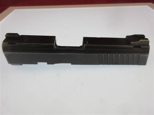 Taurus PT 140 Millennium Pro Slide Assembly
â€‹Includes Firing Pin, Sights & Extractor
â€‹Shows Some Holster Wear