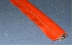 Red Silicone Coated Fiberglass Tadpole Tape,  304SS Mesh Bulb Filler, Dry & Stitched, 1/2" Bulb x 2-1/2" OAW