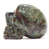 A23-14 SMALL STONE SKULL IN DRAGON BLOOD
