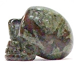 A23-14 SMALL STONE SKULL IN DRAGON BLOOD