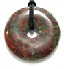 A86-10--40mm STONE DONUT IN DRAGON BLOOD