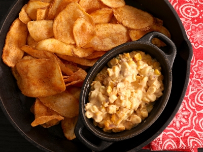 Potato chips with creamy jalapeno corn dip