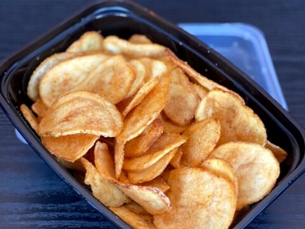 Potato chips in to go container.