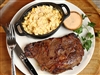 Rube's Black Angus wet-aged ribeye with a jalapeno corn side dish.