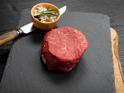 Hand-cut 7 ounce filet mignon, cut from the beef tenderloin