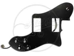 A loaded pickguard for a Telecaster Deluxe