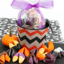 An assortment of spooktacular treats, fruit punch, black raspberry and orange fortune cookies are a ghostly delight.