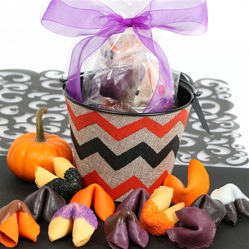 An assortment of spooktacular treats, fruit punch, black raspberry and orange fortune cookies are a ghostly delight.
