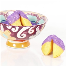 All natural vanilla fortune cookies hand dipped in white chocolate then decked out in purple amethyst bling.