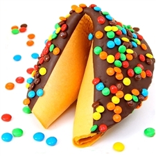 Chocolate covered giant fortune cookie covered with real M&M's. Your edible gift is sure to please especially when filled with good fortune on your personalized message.