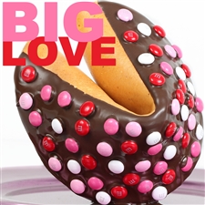 Chocolate covered giant fortune cookie covered with real M&M's. Your edible gift is sure to please especially when filled with good fortune on your personalized message.
