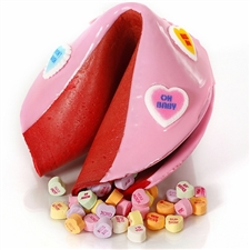 Chocolate covered giant fortune cookie covered with pink tinted chocolate and stuffed with candy hearts. Your edible gift is sure to please especially when filled with good fortune on your personalized message.