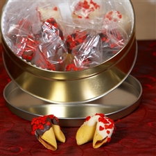 Chocolate covered fortune cookies decorated with Valentine's Day red hearts and filled with romantic messages.