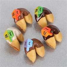 Traditional vanilla fortune cookies covered in chocolate and hand decorated with Hanukkah stars and sprinkles.