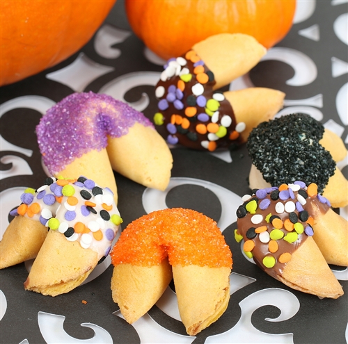 Fortune Cookies with messages for Halloween. These gourmet fortune cookies are dipped in milk, white and dark chocolate then sprinkled with monsterfetti and bling.