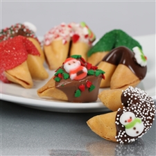 Traditional vanilla fortune cookies covered in chocolate and hand decorated with holiday sprinkles.
