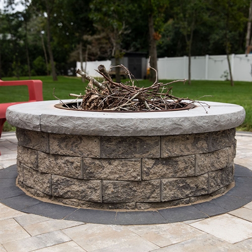 The Serafina outdoor fire pit warms up your outdoor living. Choose this elegant round fire pit to compliment your Nicolock Paving Stones designs with a charming and useful focal point. Build this fire pit from stones that suit your style.