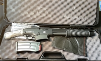 Pump Action Firearm with a 14.1" Barrel with an overall length of slightly over 26" OAL.