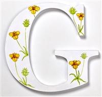 The letter 'G' depicting the wild flower Goldilocks from our unique Wild Flower Alphabet.