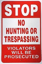 No Hunting or Trespassing Sign