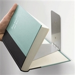 Small Floating Bookshelf with concealed feet to catch the cover of the book.