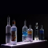 Double Wide Bottle Shelf with LED lighting and six display bottles on a black background.