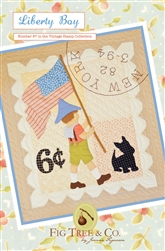 A vintage "stamp" wall hanging complete with an embroidered postmark.