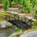 Outdoor Black Metal Arch 7-ft Garden Bridge with Side-Rails