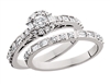 Round & Baguette Diamond White Gold Engagement Ring