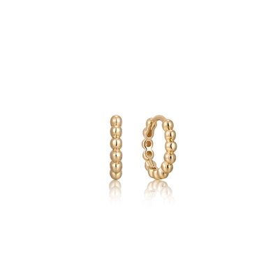 Ania Haie paced out gold orb huggie hoop earrings